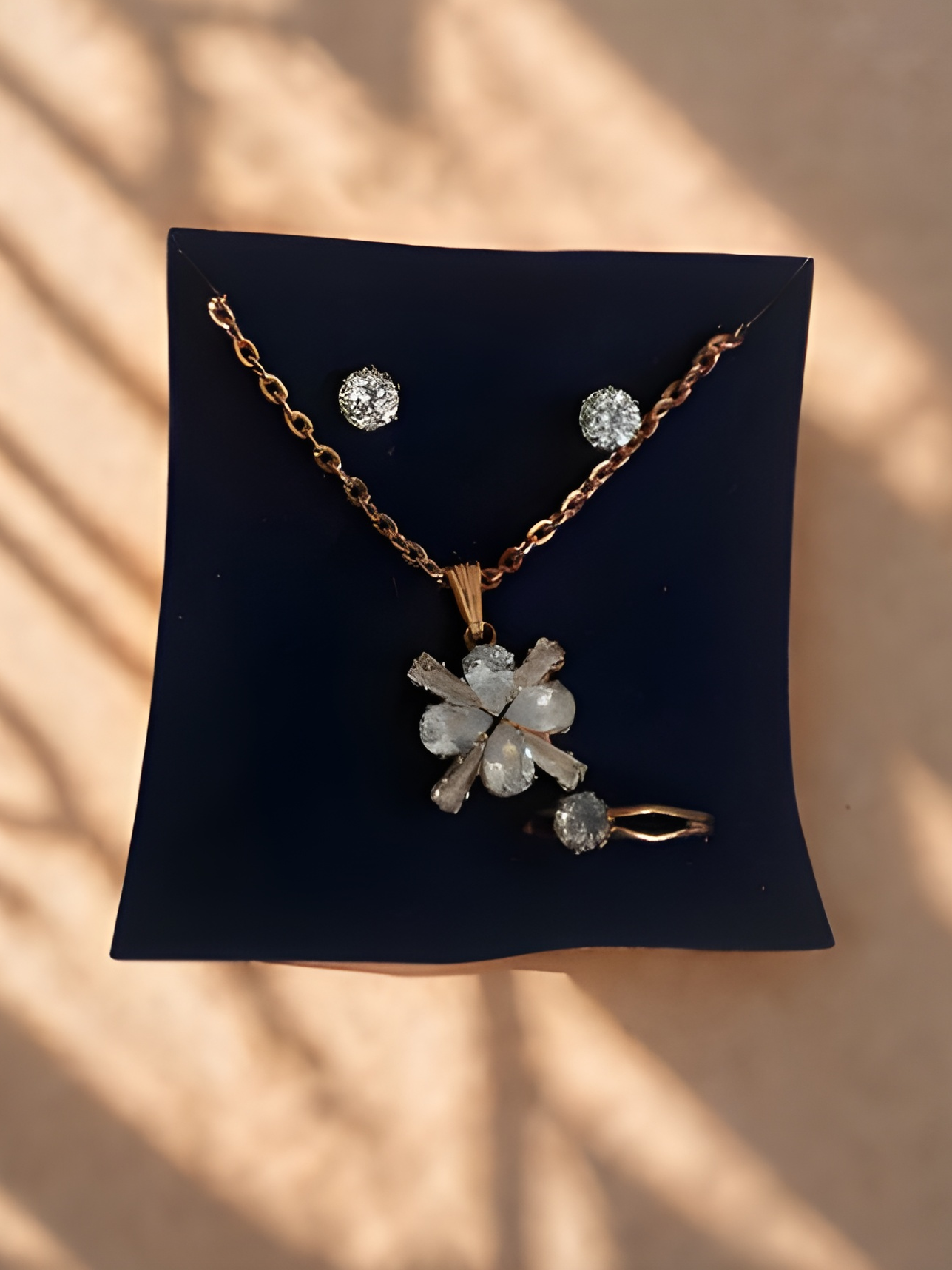 Mini artificial jewellery gift set with golden necklace, stud earrings & ring in compact box – ideal for girls, online in India.