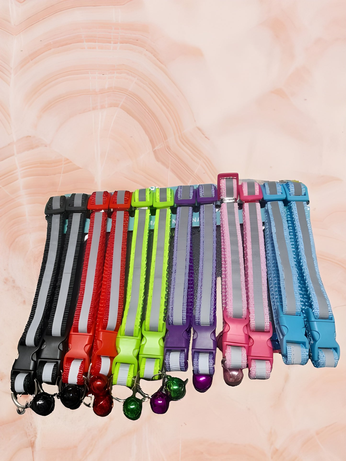 Adjustable jingle bell pet collar for cats, puppies, and small dogs in colorful nylon material, perfect for pet lovers in India.